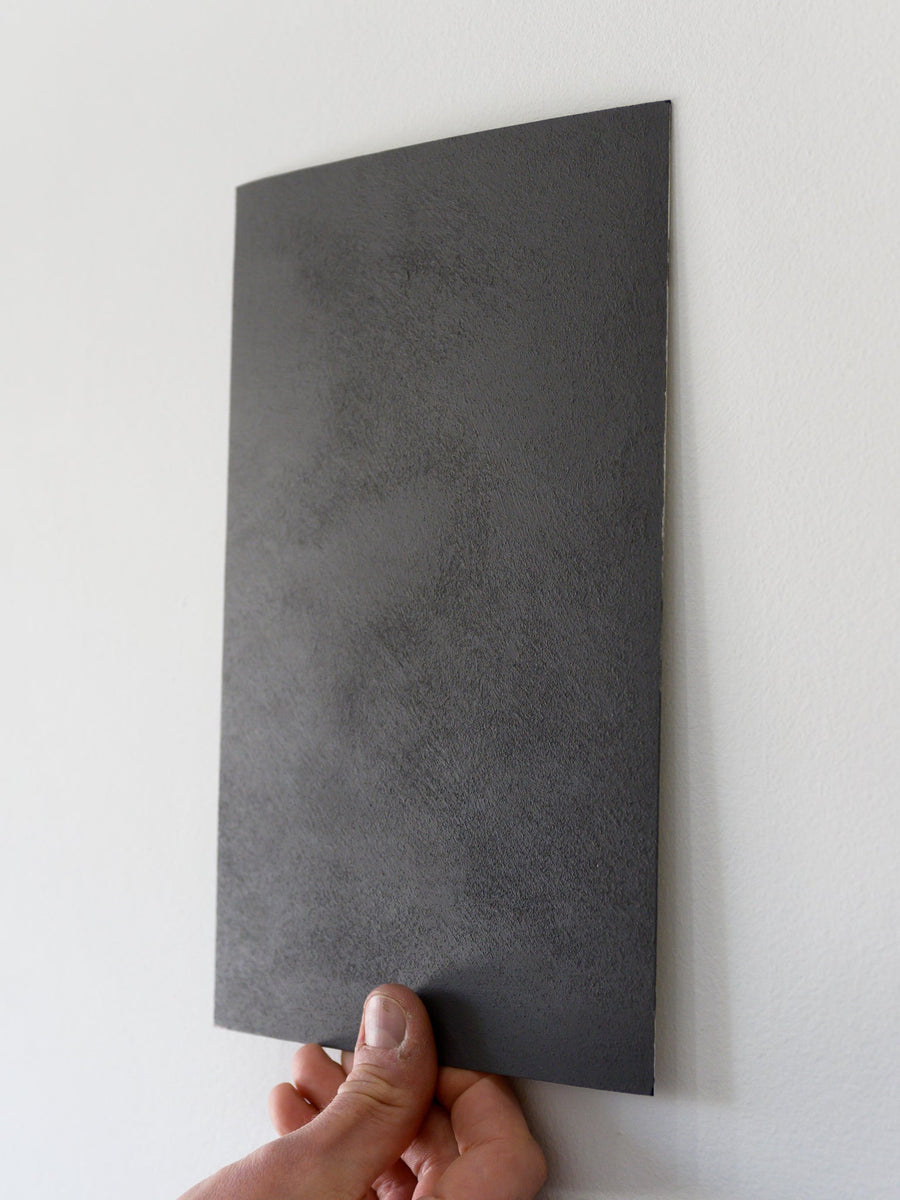 Hand-painted Suede Brushout held against a finished wall
