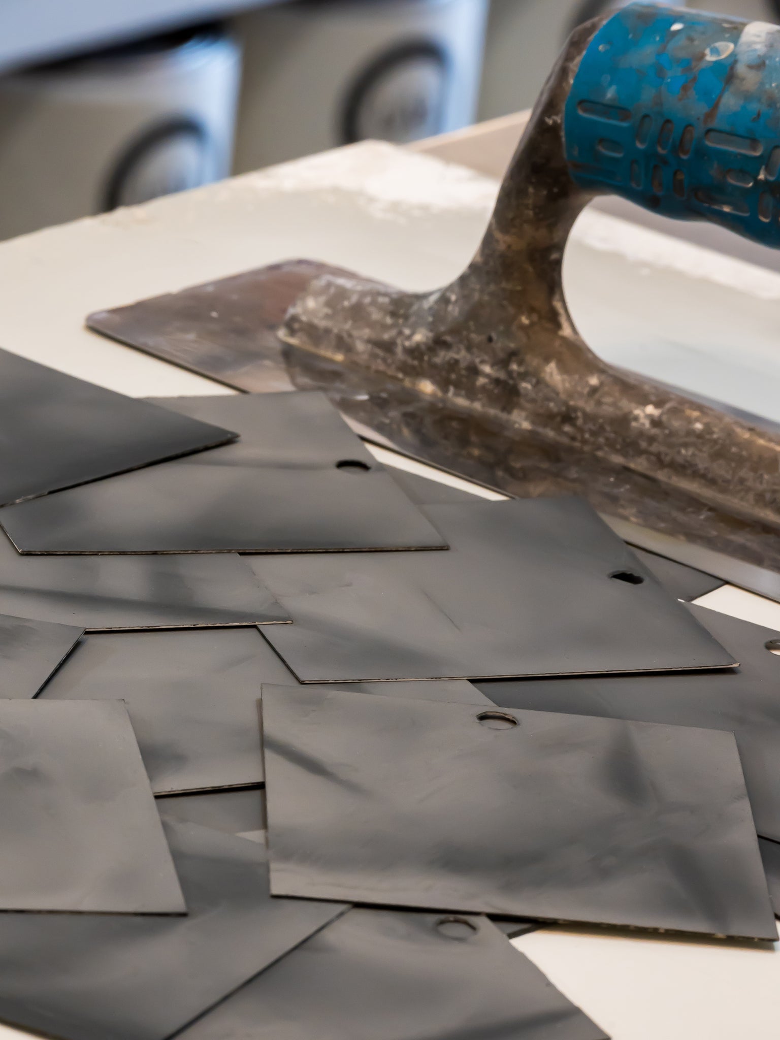 Lime Paint samples being prepared by hand