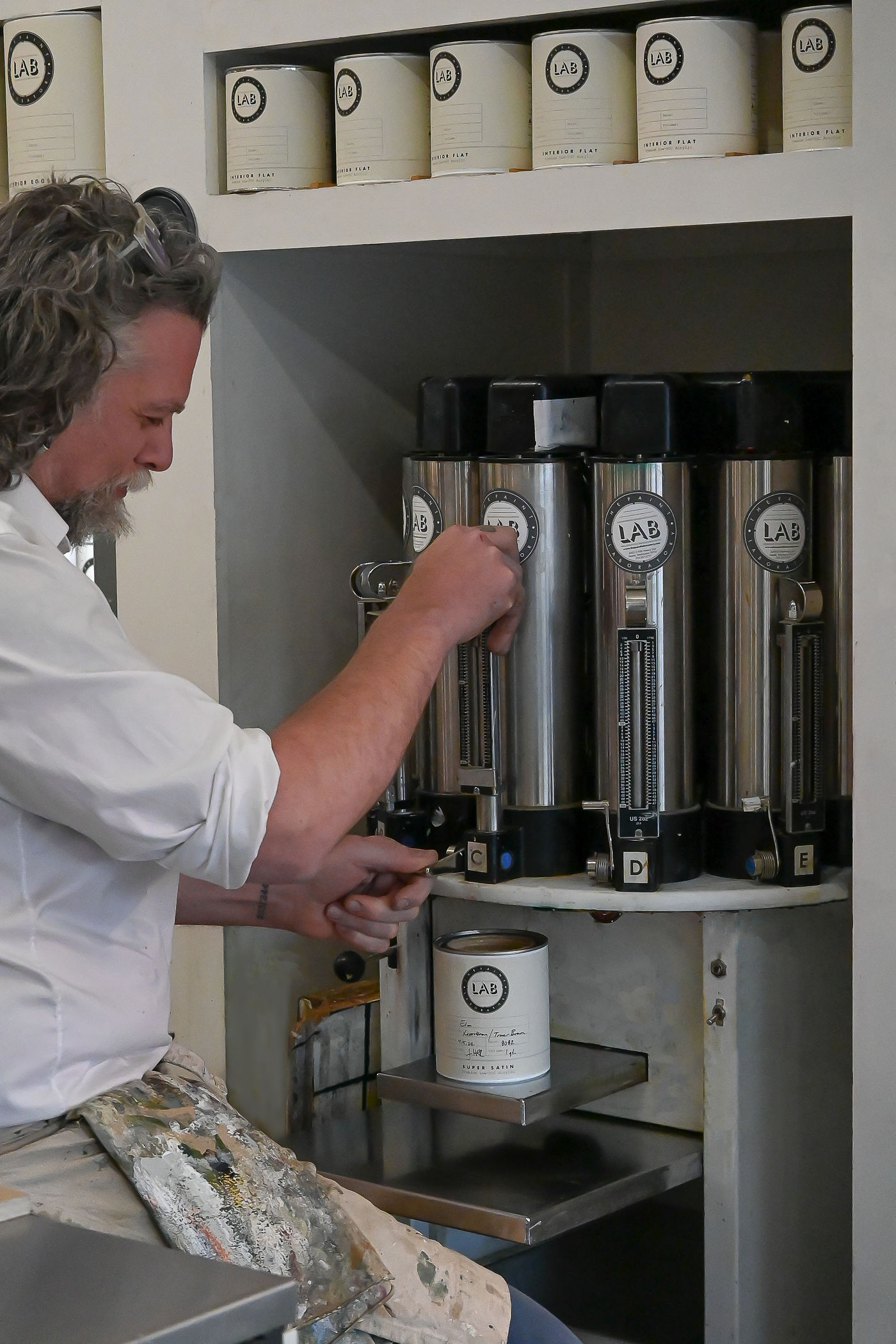 Manual Tint Machine in use - The Paint Laboratory