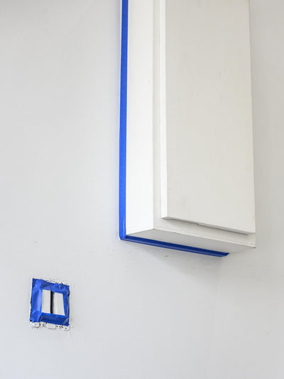 Primer on wall with tape