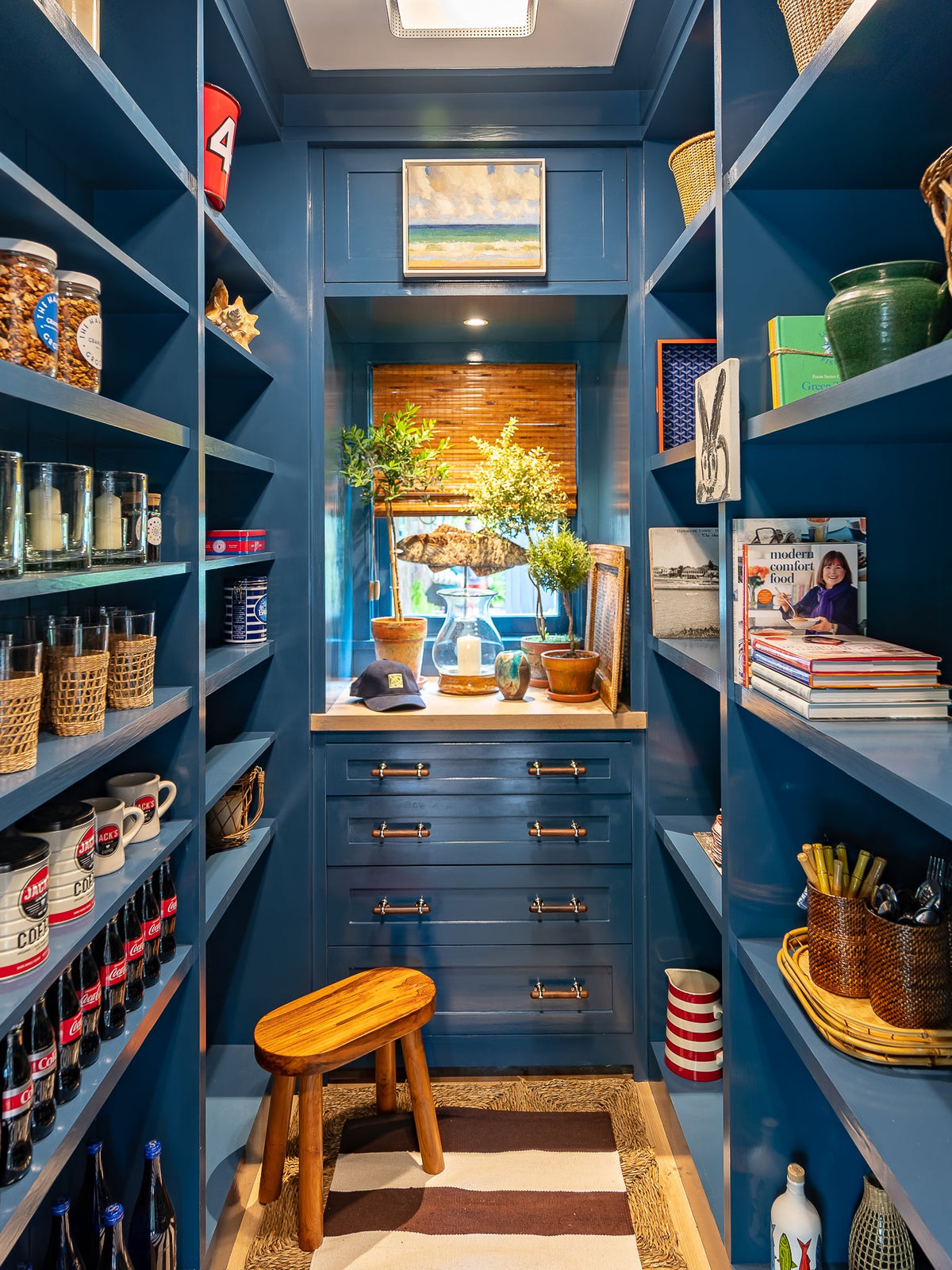 Blue built in cabinetry finished with Super Trim Paint